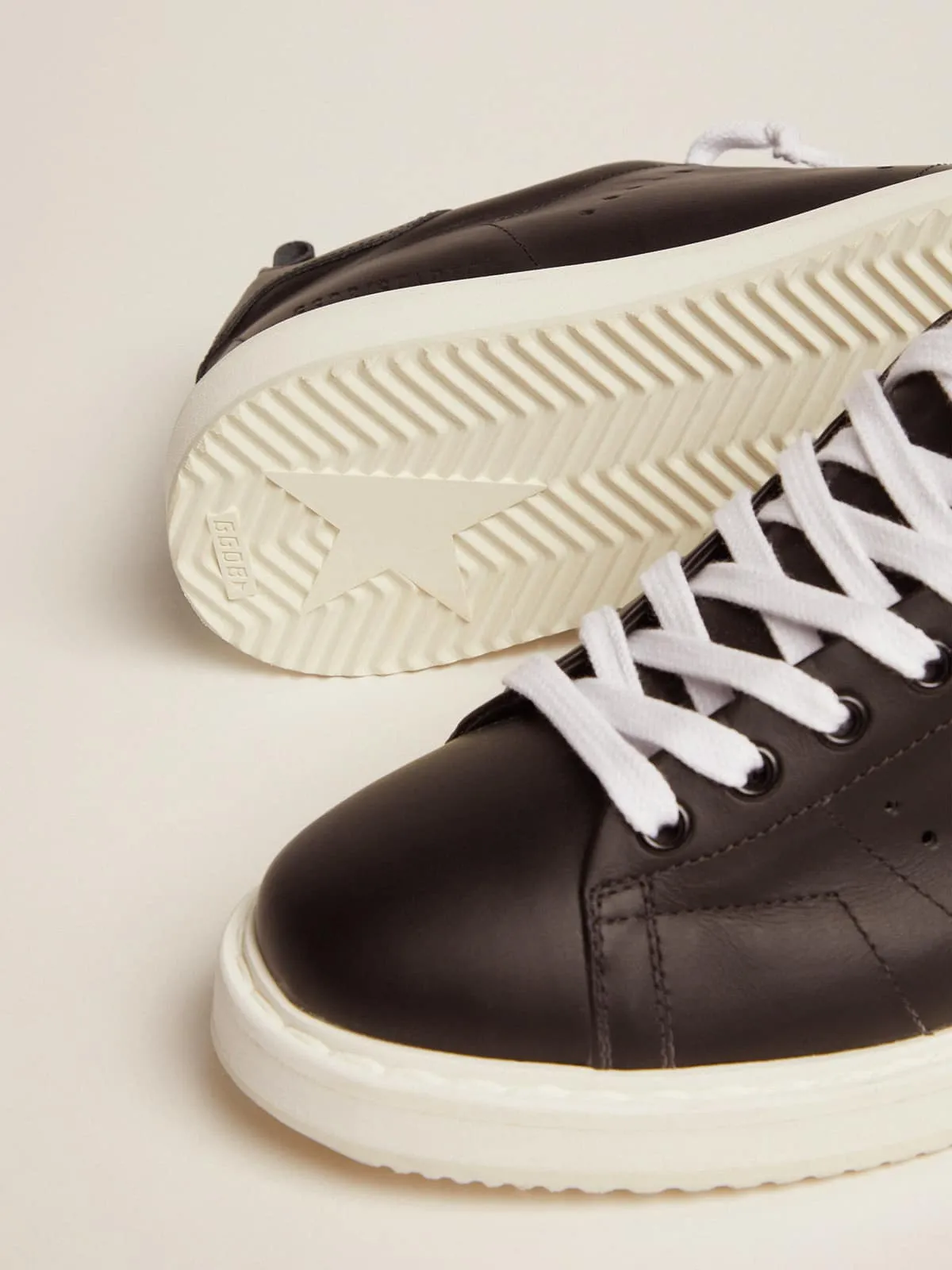 Starter sneakers in total black leather