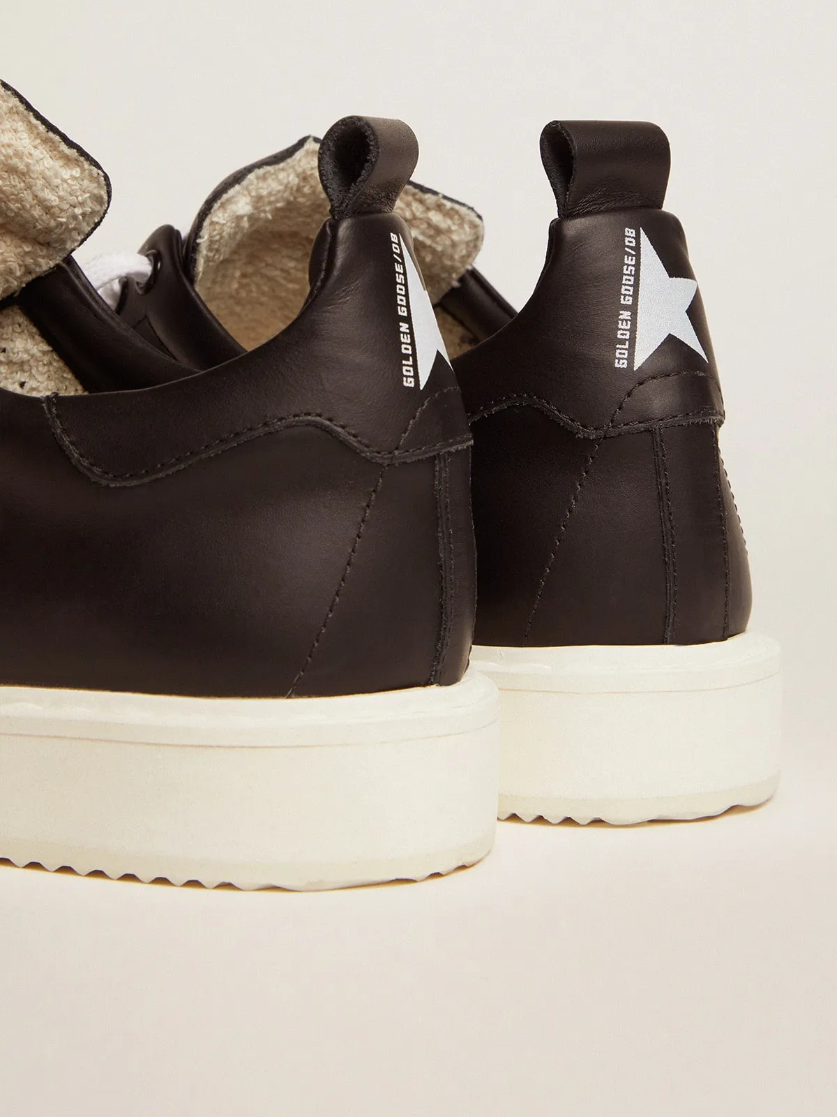 Starter sneakers in total black leather